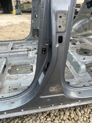 Амортизаційна стійка центральна, ліва 714012BB10 HYUNDAI