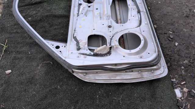 Пасажирські передні двері 76020H1010 HYUNDAI