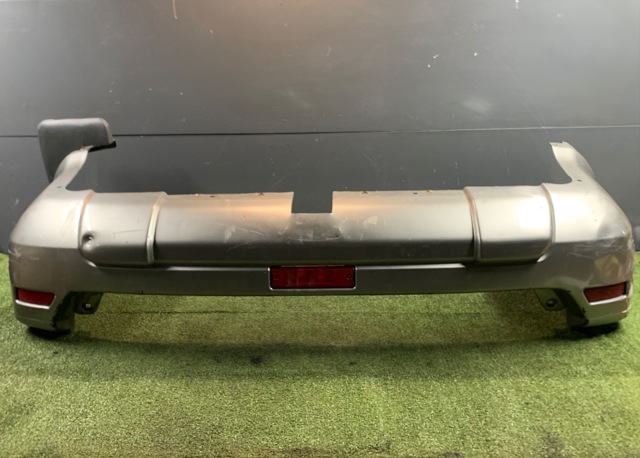 Буфер (бампер) задній 850228H326 NISSAN