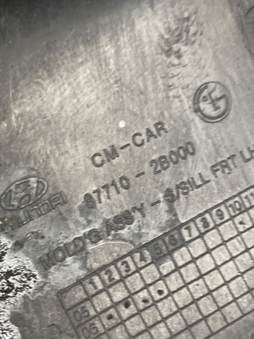 Накладка зовнішня (молдинг) порога, лівий 877102B000 HYUNDAI