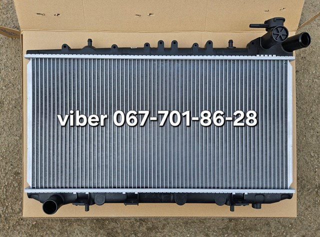 Радіатор охолодження 2141065C01 NISSAN