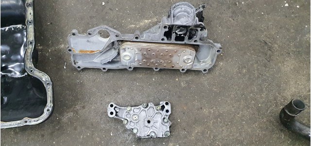 Радіатор масляний (холодильник), під фільтром 1449177 FORD