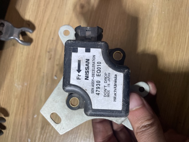 Датчик поздовжнього прискорення 47930EQ010 NISSAN