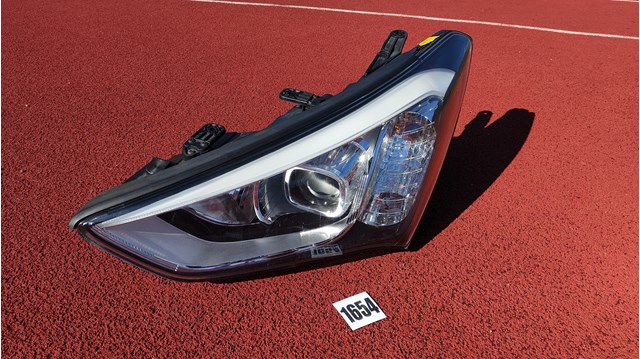 Блок фара ліва 921014Z010 HYUNDAI