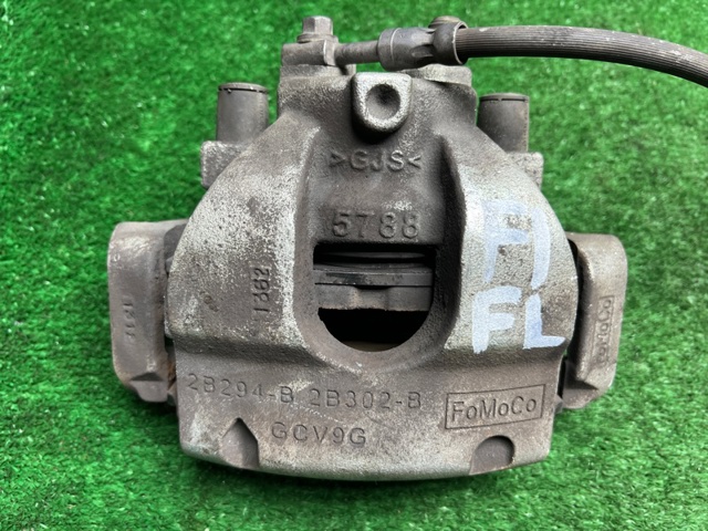 Кронштейн гальмівного супорта JX6Z2B292J FORD