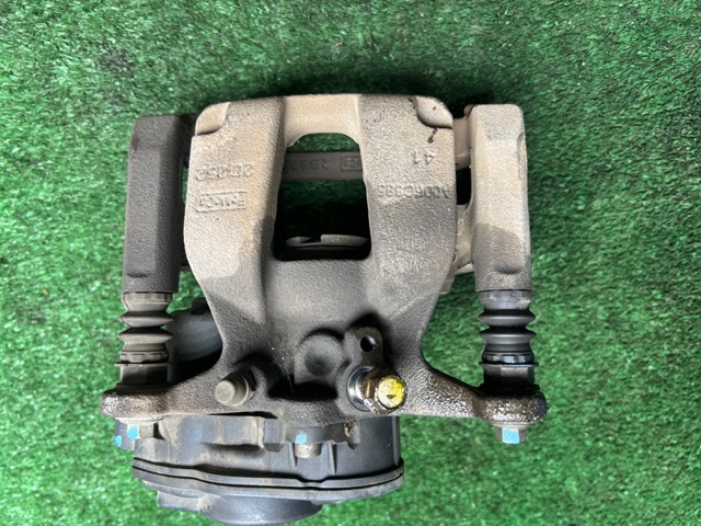 Скоба гальмівного заднього супорта L1MZ2B511C FORD