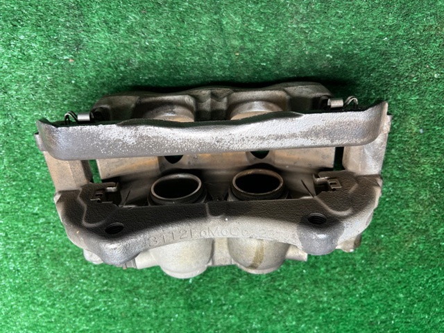 Скоба гальмівного супорта переднього L1MZ2C396H FORD