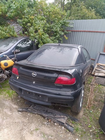 Бампер задній 1404116 OPEL
