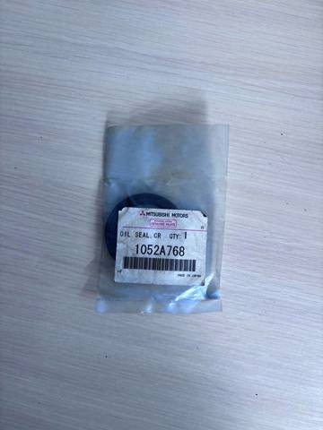 Сальник коленвала двигуна, передній 1052A768 MITSUBISHI