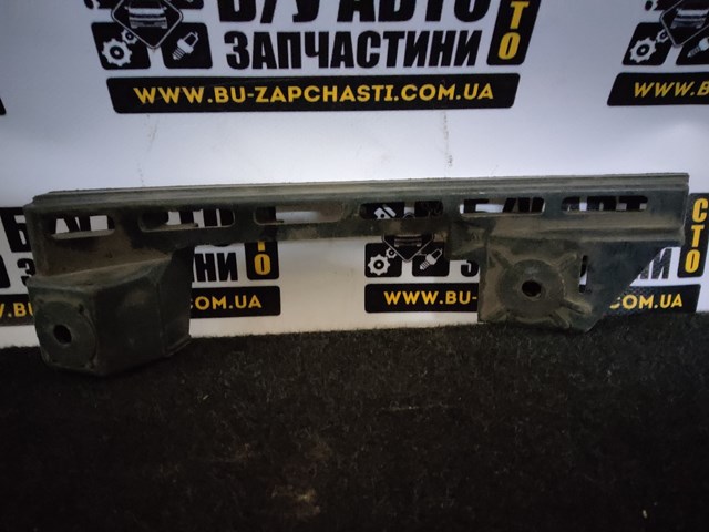 Лівий кронштейн переднього бампера 1T0807889B VAG