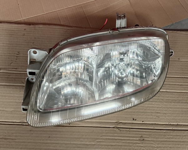 Фара ліва передня BC5M51040F MAZDA