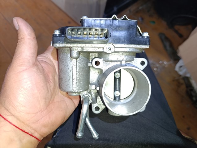 Блок дросельної заслінки 1450A174 MITSUBISHI