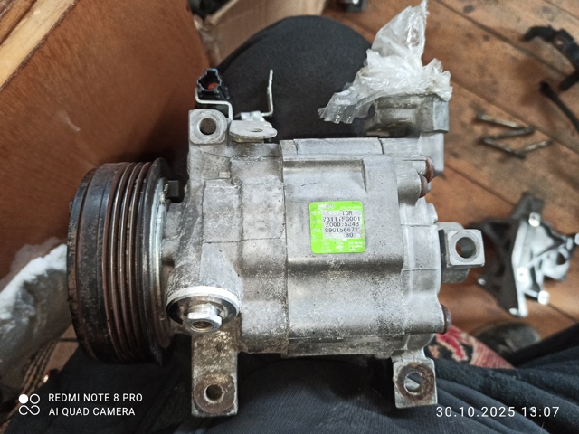 Компресор кондиціонера 73111FG001 SUBARU