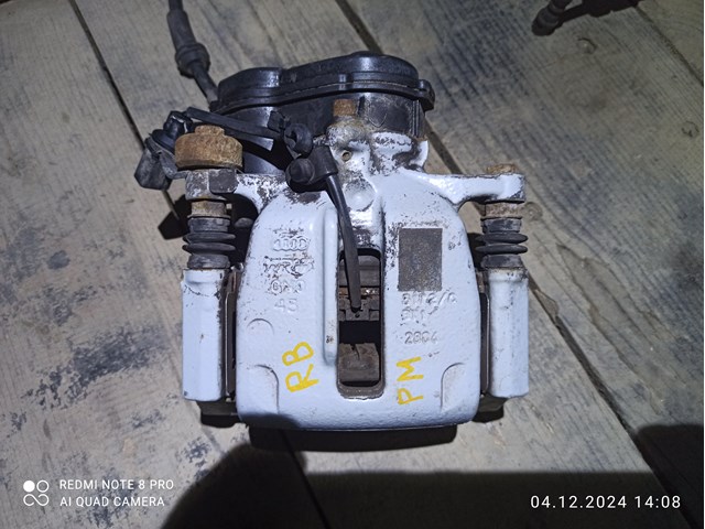Супорт гальмівний задній правий 95B615424D PORSCHE