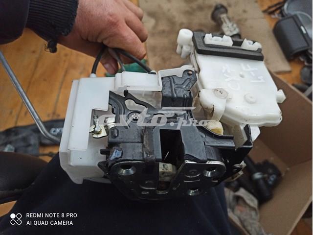 Замок дверей водія EH1459310E MAZDA