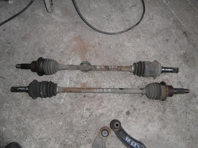Піввісь задня, права GD702550XA MAZDA