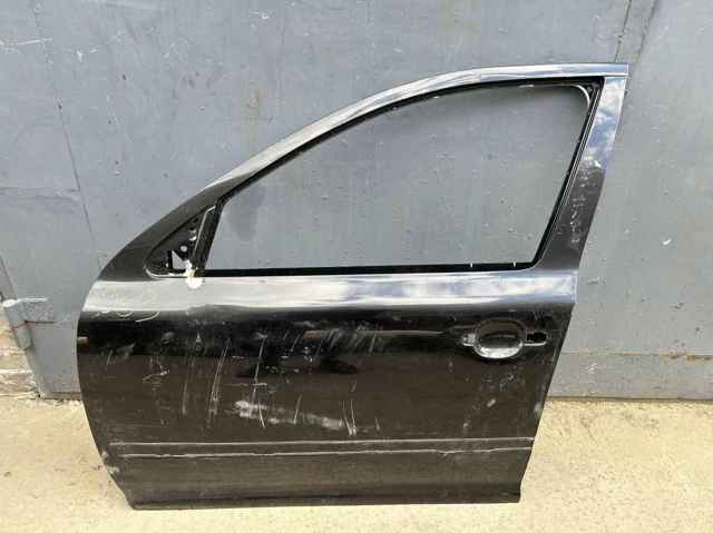 Водійські двері Шкода Октавія II A5