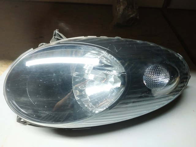 Фара комбінована, передня 26010AX705 NISSAN
