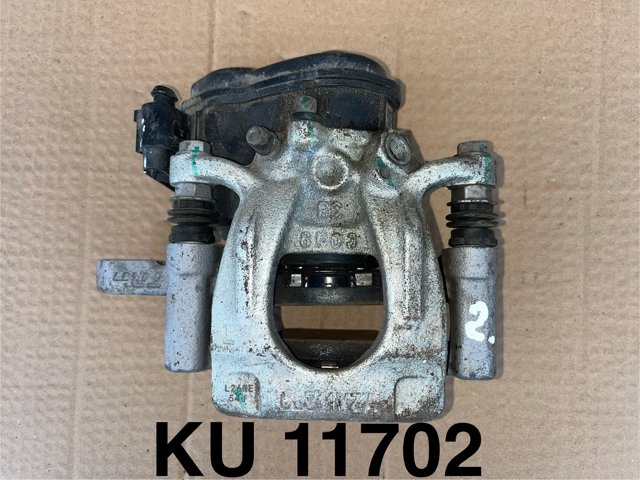 Задній гальмівний супорт лівий 440114CA0B NISSAN