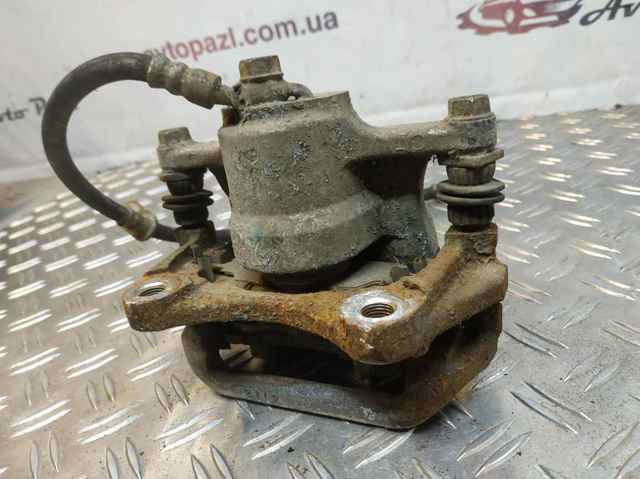 Супорт гальмівний задній правий 4783048090 TOYOTA