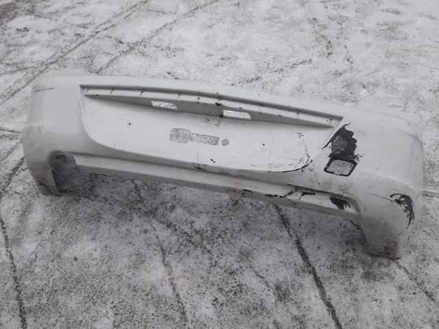 Кожух бампера заднього 52022577 GM