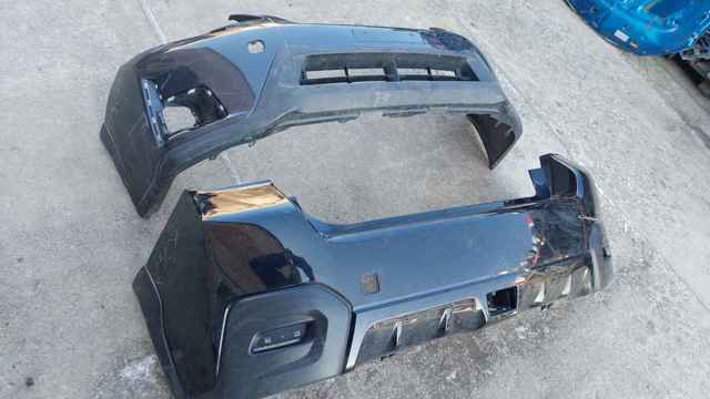 Кожух бампера заднього 57704FJ040 SUBARU