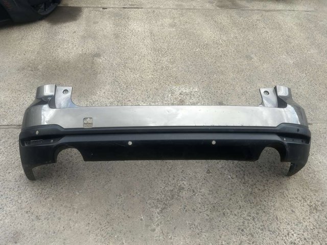 Кожух бампера заднього 57704SG012 SUBARU