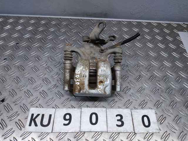 Задній гальмівний супорт лівий 5QM615423A VAG