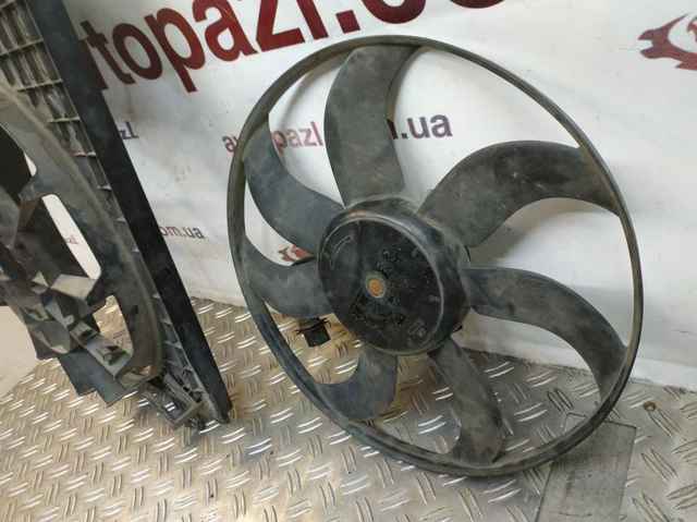 Кожух вентилятора 6RU121207B VAG