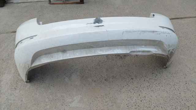 Буфер (бампер) задній 6V9807421F VAG