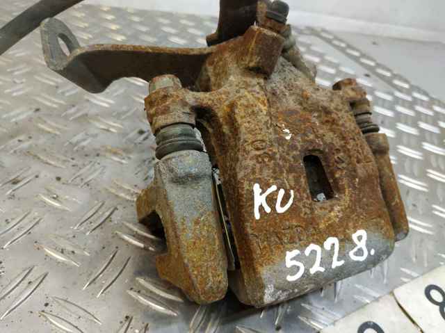 Задній гальмівний супорт лівий K0Y12699Z MAZDA