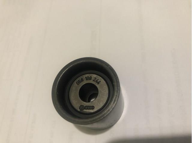 Ролик ременя ГРМ, паразитний 058109244 INA