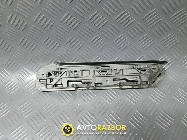 Кронштейн бампера переднього, зовнішній лівий 1T0807049 VAG
