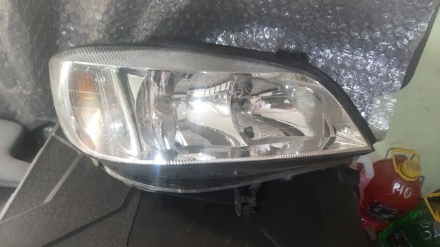 Фара передня права 1216276 GM