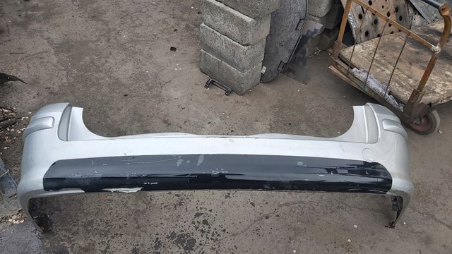 Бампер задній 24460461 GM