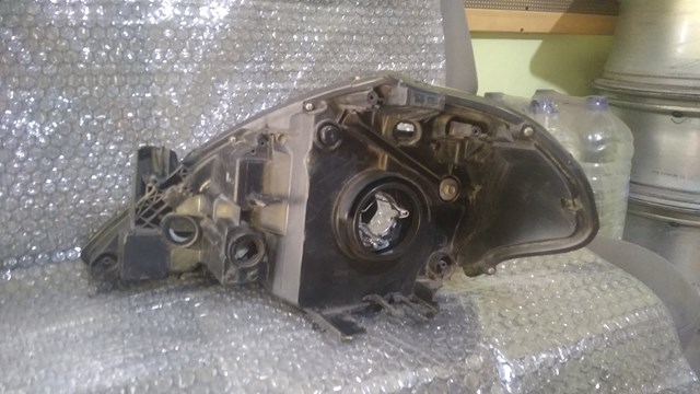 Фара передня права 26010EE900 NISSAN
