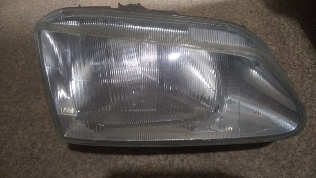 Фара передня права 7701040683 RENAULT