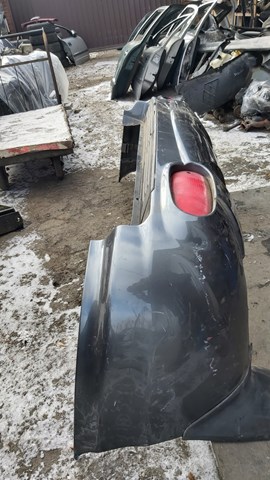 Бампер задній 8661026900 HYUNDAI