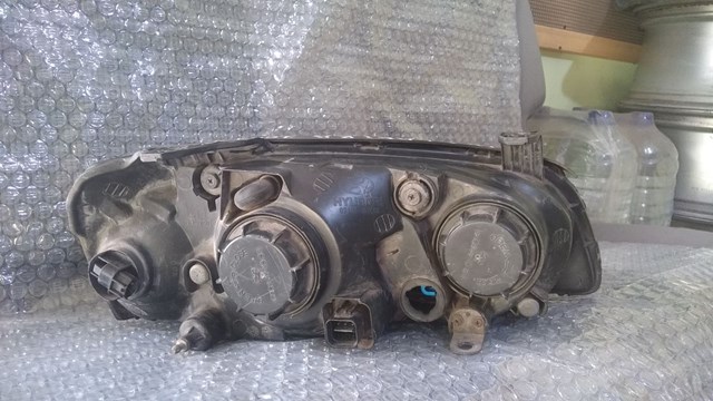 Фара основна ліва 921012 HYUNDAI