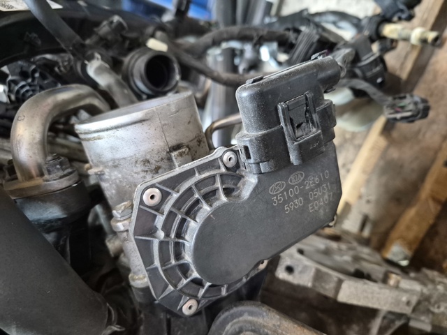 Дросільна заслінка в зборі 351002E610 HYUNDAI
