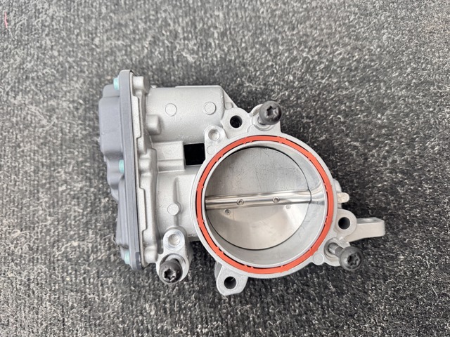 Блок дросельної заслінки 13548601651 BMW