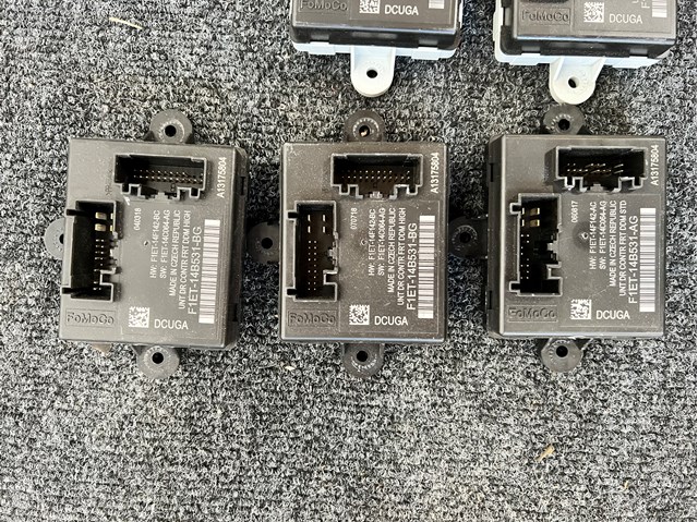 Блок комфорту передніх дверей F1ET14B531BG FORD