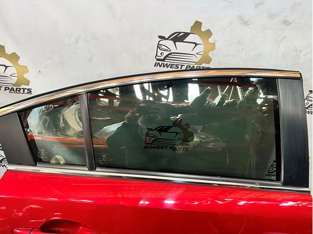 Скло заднє праве GHK172510C MAZDA