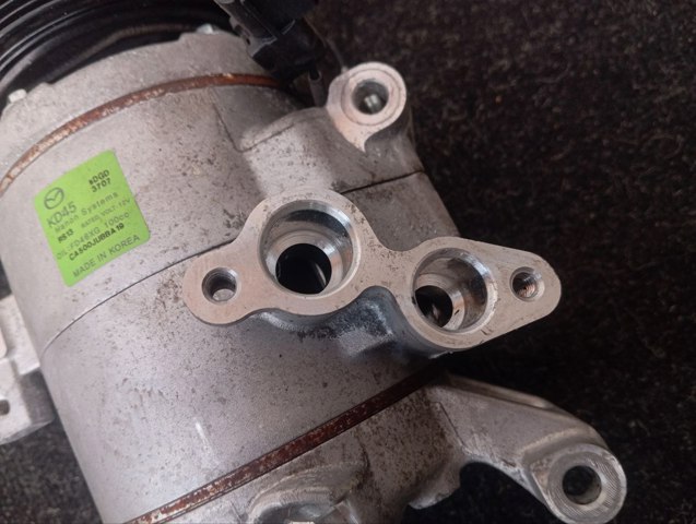 Компресор кондиціонера KD7761450A MAZDA