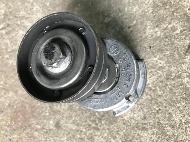 Натягувач приводного ременя 03C145299C VAG