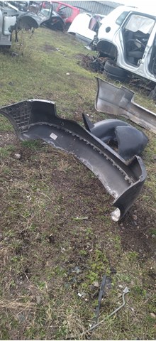 Бампер задній 1T0807417 VAG