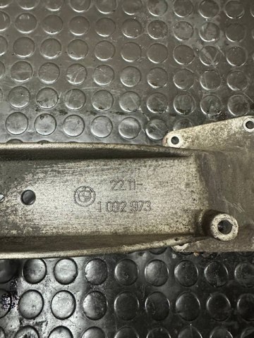 Кронштейн подушки (опори) двигуна, лівої 1092973 BMW