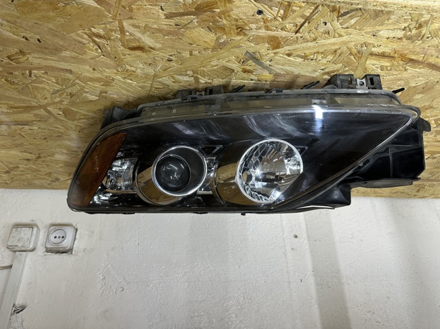 Фара ліва передня EG2251041G MAZDA