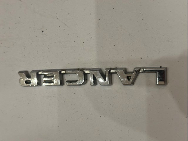 Емблема на кришку багажника, фірм.значок MN154914 MITSUBISHI