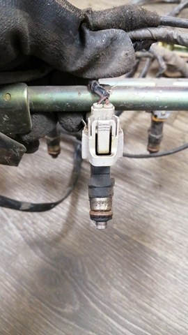 Форсунка інжектора 16600CD70A NISSAN